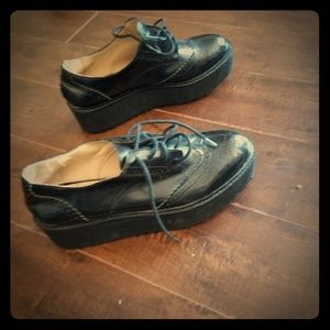 Black platform sneakers